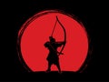 Samurai-archer with bow. Figure on sunset background